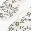 Flip-Flops mit Metallbeschlägen und TH-Schriftzug