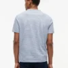 Gestreiftes T-Shirt aus Leinenmischung mit Tasche Gestreiftes T-Shirt aus Leinenmischung mit Tasche