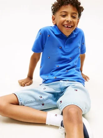 Kinder-Polohemd mit durchgehendem Flaggenprint Kinder-Polohemd mit durchgehendem Flaggenprint