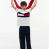 Kinder-Polohemd mit Farbblock-Flaggenmuster aus Stretch Kinder-Polohemd mit Farbblock-Flaggenmuster aus Stretch