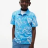 Kinder-Stretch-Polo mit tropischem Print Kinder-Stretch-Polo mit tropischem Print