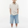 Kinder-Stretch-Polo mit tropischem Print Kinder-Stretch-Polo mit tropischem Print