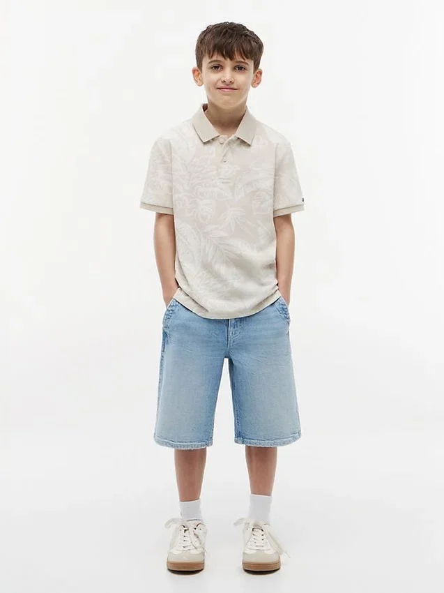 Kinder-Stretch-Polo mit tropischem Print Kinder-Stretch-Polo mit tropischem Print