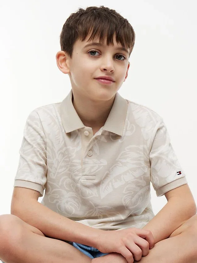 Kinder-Stretch-Polo mit tropischem Print Kinder-Stretch-Polo mit tropischem Print
