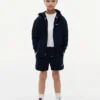 Kinder-Sweatshorts mit tonalem Flaggenlogo