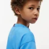 Kinder-T-Shirt mit tonalem Flaggenlogo Kinder-T-Shirt mit tonalem Flaggenlogo