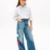 Kinderjeans mit Sternmotiv, hohem Bund und weitem Bein Kinderjeans mit Sternmotiv, hohem Bund und weitem Bein