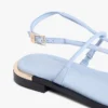 Sandale aus Leder mit Metallic-Akzenten
