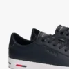 Sneaker aus vulkanisiertem Leder mit Flaggenstreifen