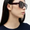Sonnenbrille mit auffälligem Schmetterlingsrahmen Sonnenbrille mit auffälligem Schmetterlingsrahmen