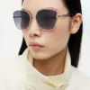 Sonnenbrille mit Metallrahmen in Schmetterlingsform