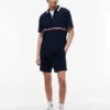 Tommy Jeans Relaxed Polo mit Viertelreißverschluss Tommy Jeans Relaxed Polo mit Viertelreißverschluss
