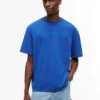 Tommy Jeans T-Shirt mit Distressed-Logo Tommy Jeans T-Shirt mit Distressed-Logo